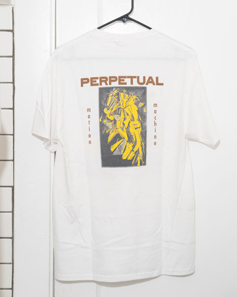 a white  graphic t-shirt on a hanger. The graphic is printed in yellow, brown and black. it shows a reproduction of the painting Nude Descending a Staircase by Marcel Duchamp.above and to the right and left are printed the words perpetual motion machine