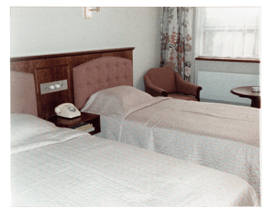 two beds in a hotel room